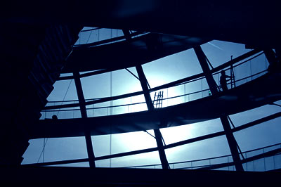 Workmen clean the cupola atop the Bundestag, in the old Reichstag